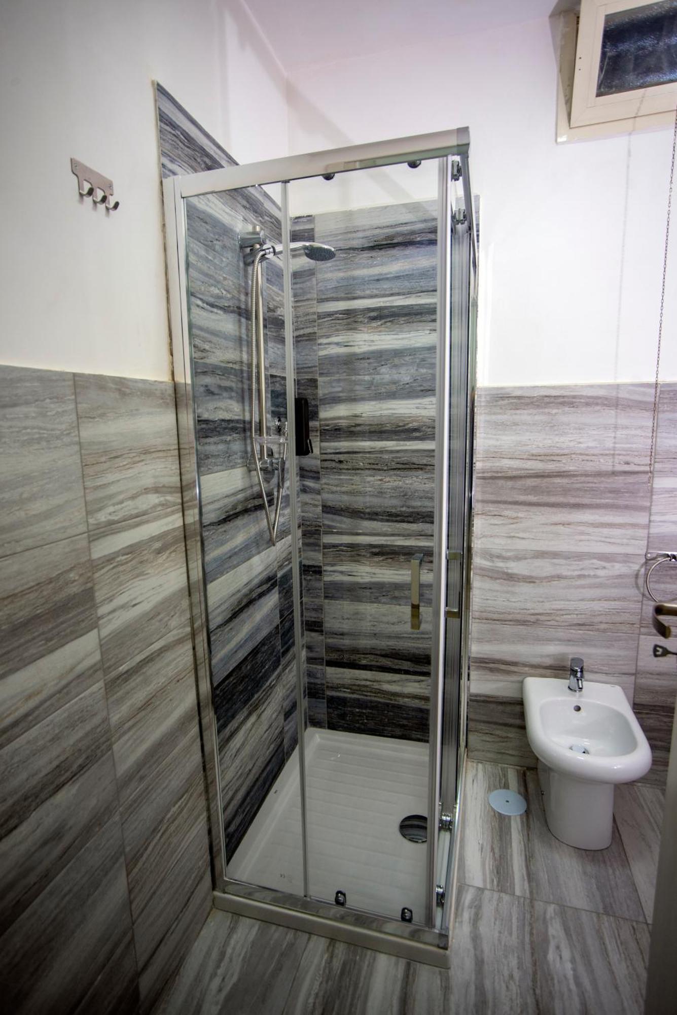 Na City Rooms Napoli Bagian luar foto